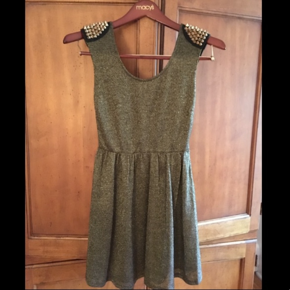 Adorable boutique dress with fun shoulder details!
